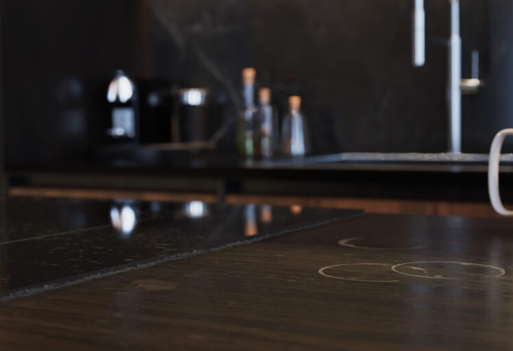 Kitchen counter top with visible ring marks after mugs.