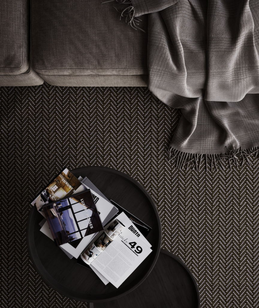Living room detail,, view from above a table with magazines.
